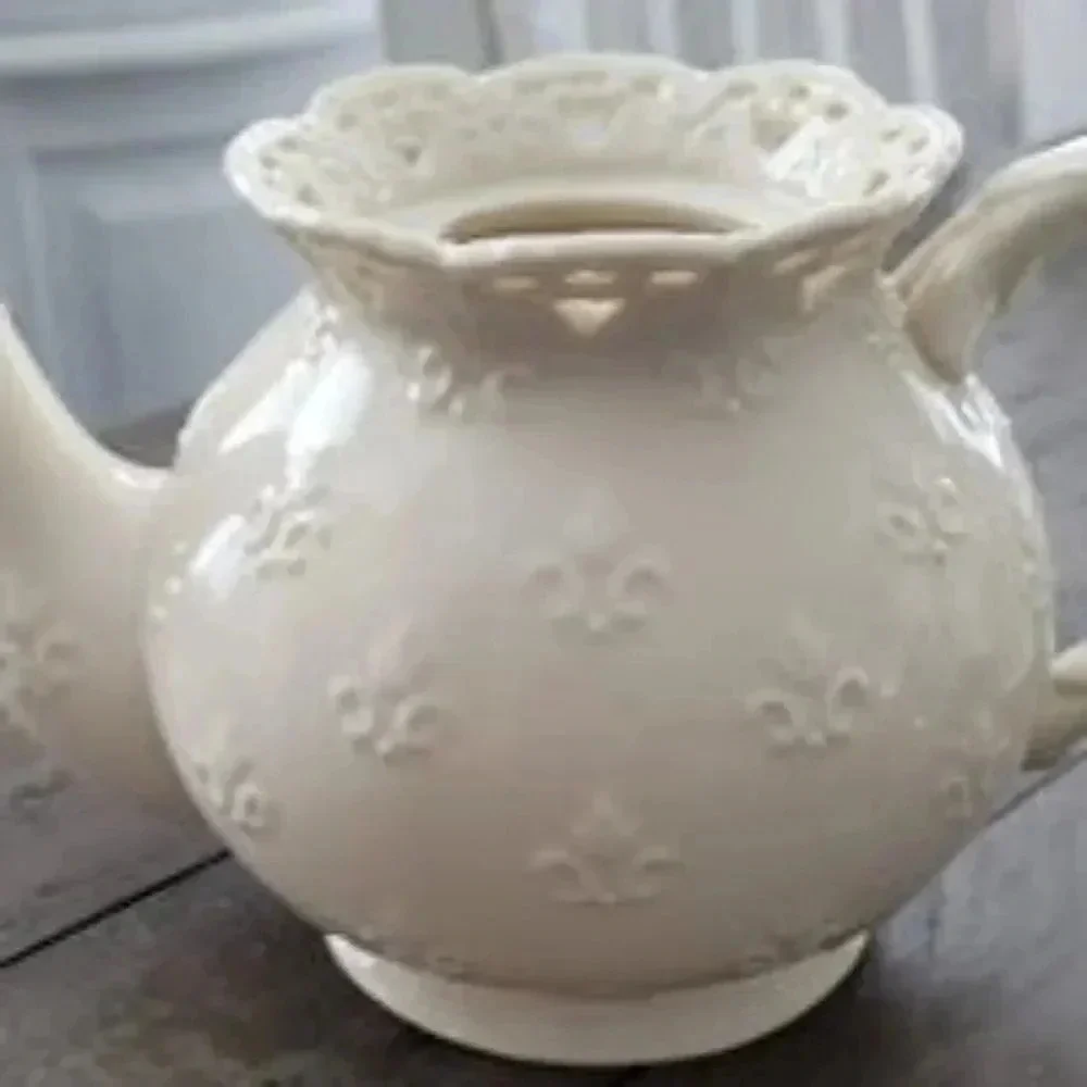 Skye McGhie Cream lace porcelain teapot and tea light warmer stand